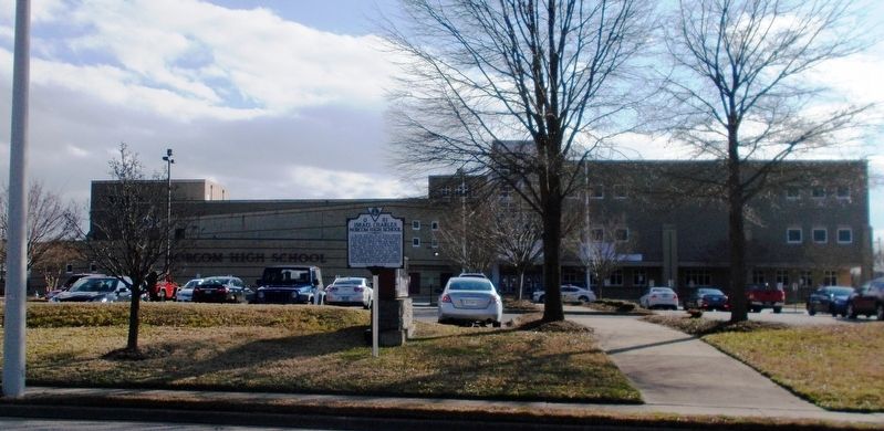 I.C. Norcom High School and its marker. image. Click for full size.