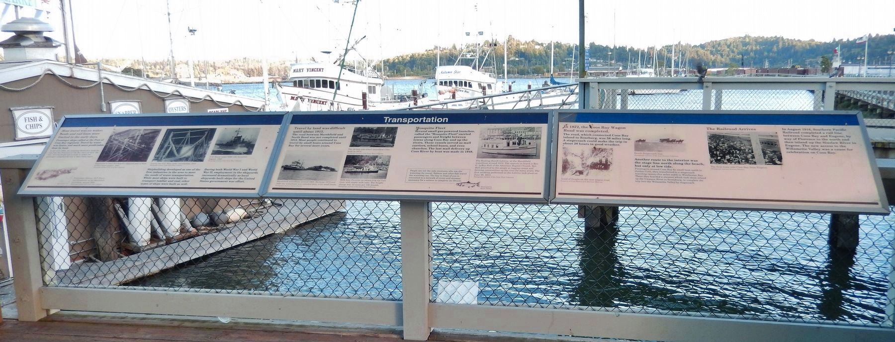 Transportation Marker (<i>wide view; this panel in center; adjacent panels to left and right</i>). Click for full size. Transportation Marker (<i>wide view; this panel in center; adjacent panels to left and right</i>) image. Click for full size.