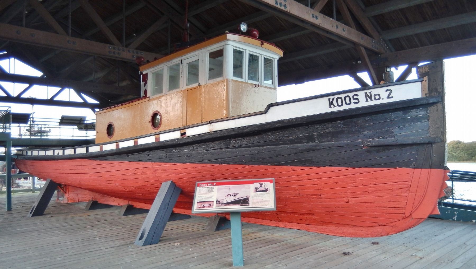<i>Koos No. 2</i> (<i>marker located in front of restored tugboat</i>) image. Click for full size.