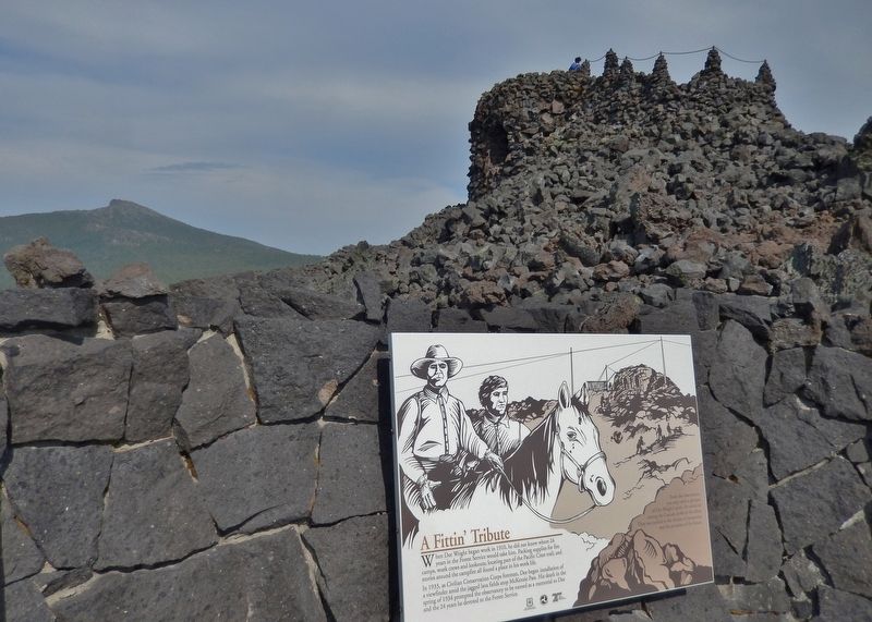 A Fittin' Tribute Marker (<i>wide view; Dee Wright Observatory in background</i>). Click for full size. A Fittin' Tribute Marker (<i>wide view; Dee Wright Observatory in background</i>) image. Click for full size.