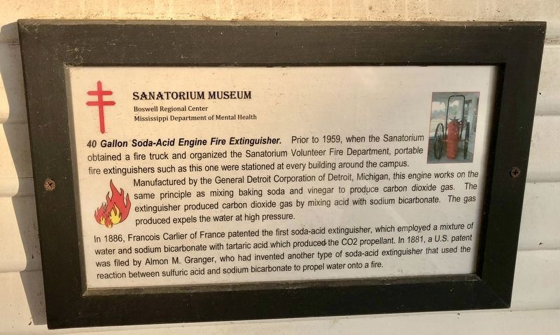 Sign about a fire extinguisher located on the porch. image. Click for full size.