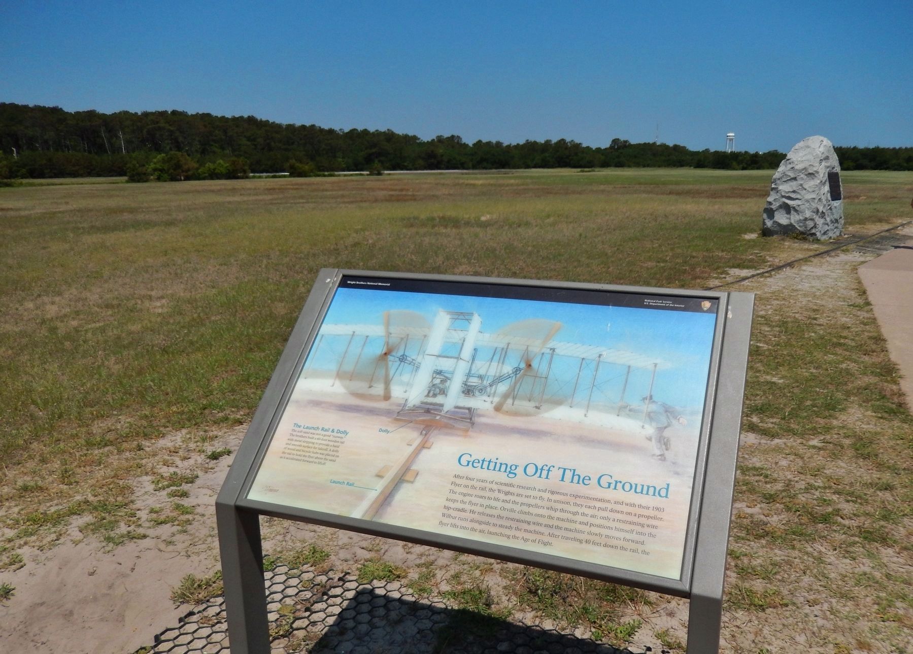 Getting Off the Ground Marker (<i>wide view; First Flight Monument in background, right</i>) image. Click for full size.