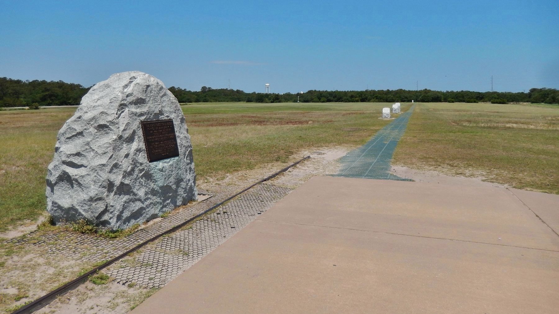 Launch Rail (<i>visible running past First Flight Memorial - the point of take-off</i>) image. Click for full size.