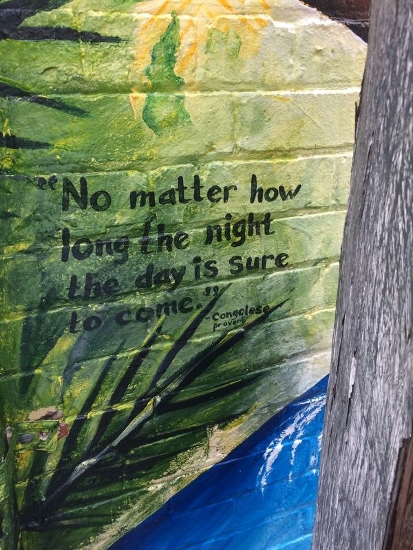 Closeup of text on the mural directly behind the artist's statement sign. Click for full size. Closeup of text on the mural directly behind the artist's statement sign image. Click for full size.