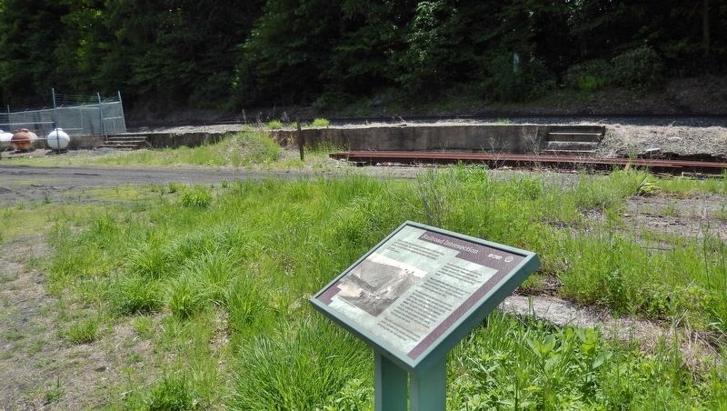 Railroad Intersection Marker (<i>wide view; railroad and old foundations visible in background</i>) image. Click for full size.
