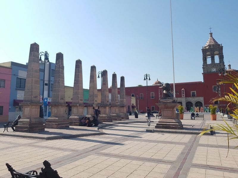 The Miguel Hidalgo bust and obelisks in the plaza image. Click for full size.