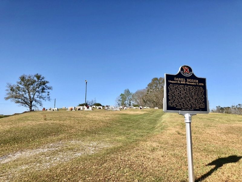 Marker with the Dozier Cemetery in background. image. Click for full size.