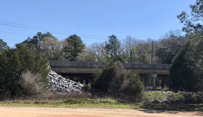 Not the original bridge from 1864, but the rock area is where the original marker was located. image. Click for full size.