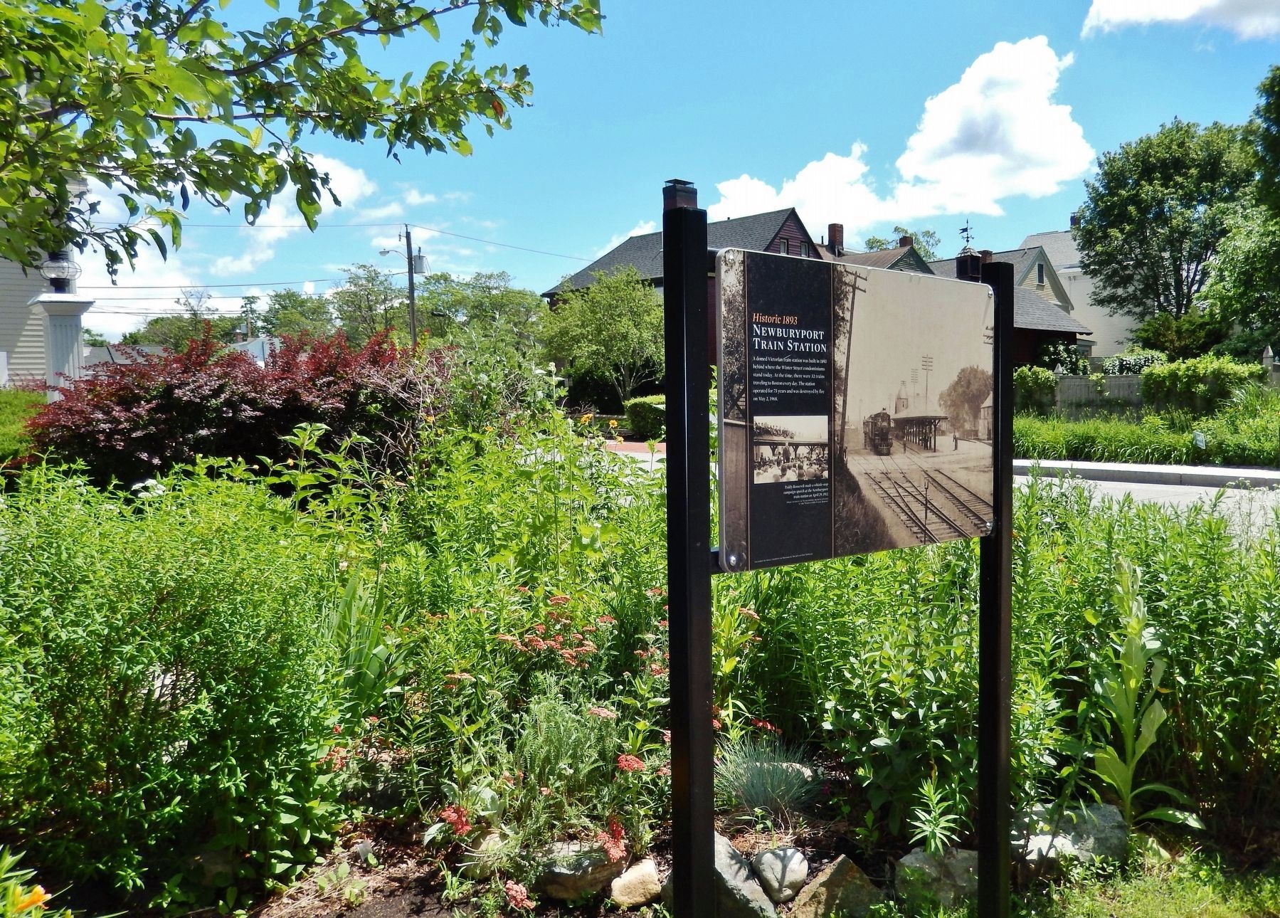 Historic 1893 Newburyport Train Station Marker (<i>site of former station in background</i>). Click for full size. Historic 1893 Newburyport Train Station Marker (<i>site of former station in background</i>) image. Click for full size.