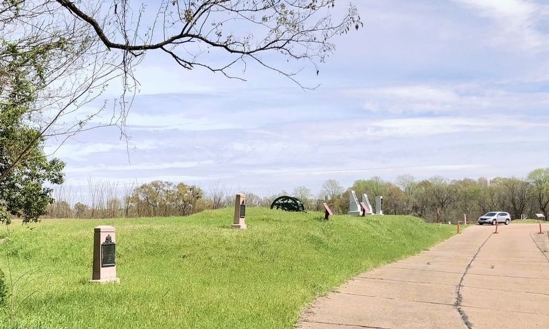 Looking east towards Old Graveyard Road, marker is in middle of three to right of cannon. image. Click for full size.