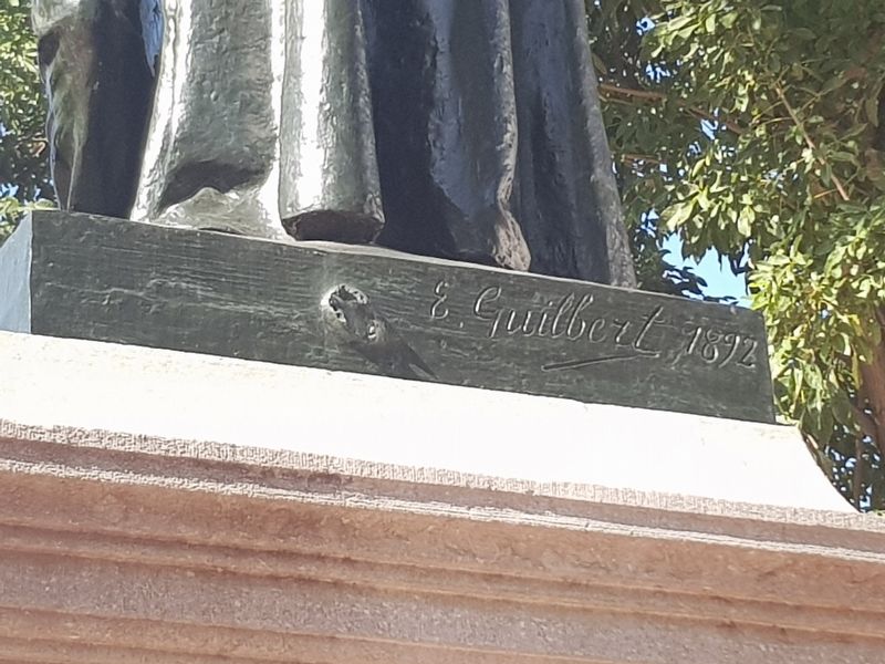 Francisco X. Billini statue sculptor's mark, E. Guilbert 1892 image. Click for full size.