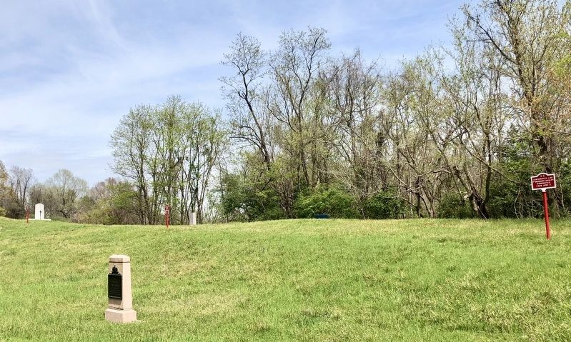 View looking east from Confederate Avenue to marker, just right of center, in the tree line. image. Click for full size.