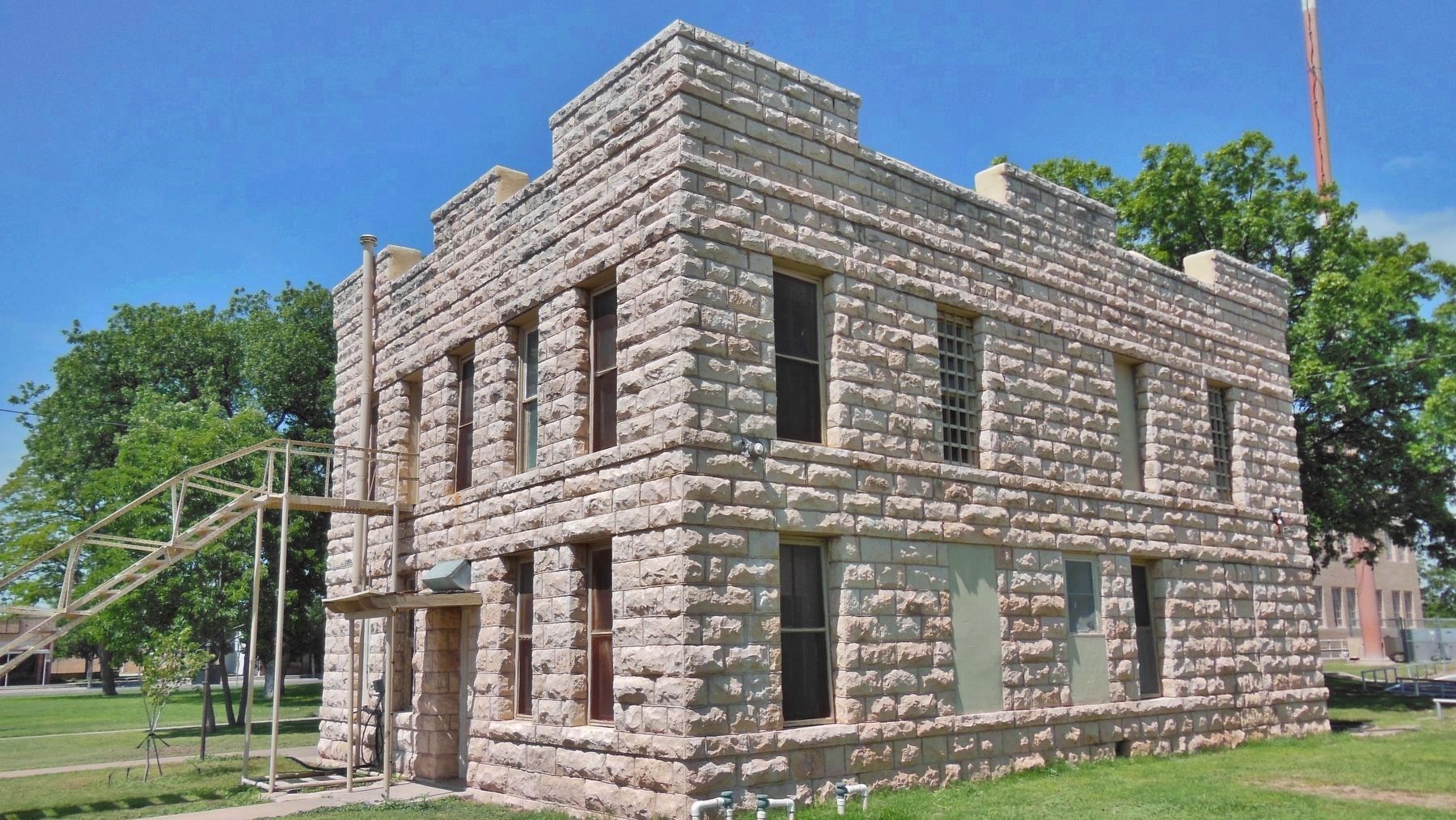 Sterling County Jail (<i>southwest corner view; backside of marker visible on left</i>). Click for full size. Sterling County Jail (<i>southwest corner view; backside of marker visible on left</i>) image. Click for full size.