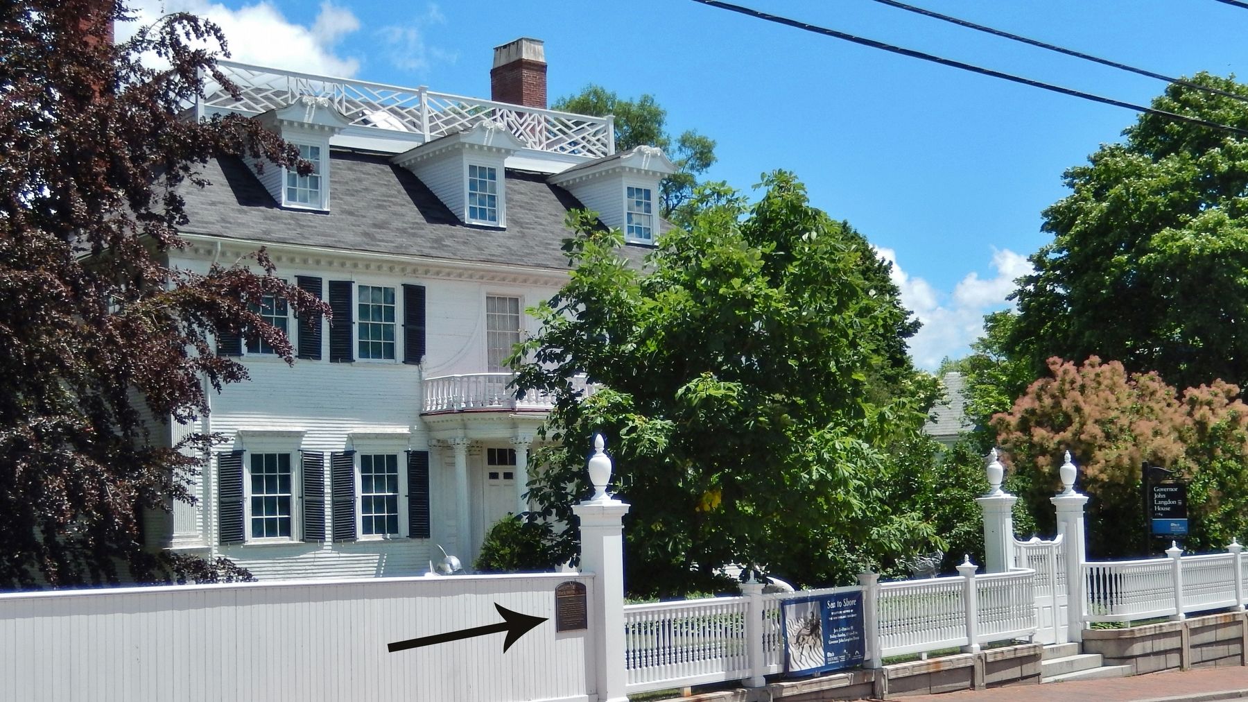 Siras Bruce Marker (<i>wide view; marker visible on fence, near center</i>). Click for full size. Siras Bruce Marker (<i>wide view; marker visible on fence, near center</i>) image. Click for full size.
