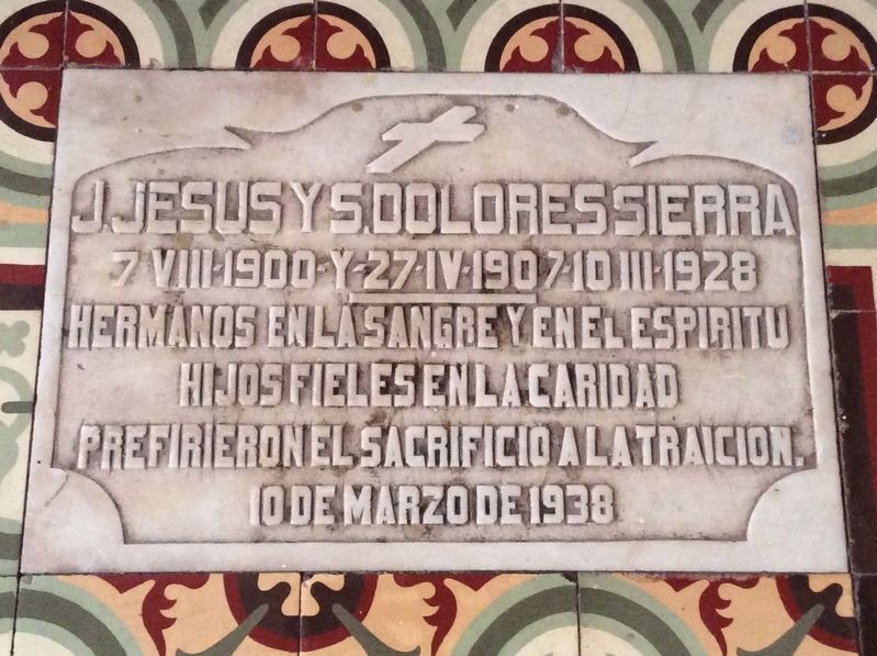 Tomb of Jesús and Dolores Sierra, lay church members murdered with Father Nieves image. Click for full size.
