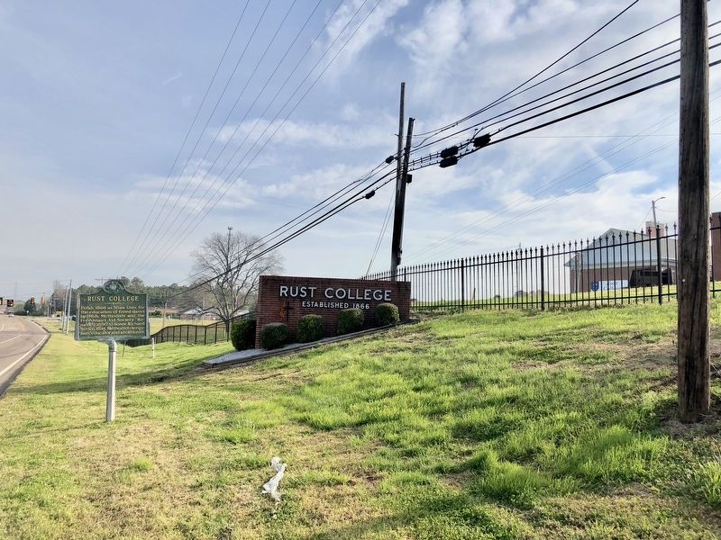 Partial view of college campus, marker & college sign along North Memphis Street. image. Click for full size.