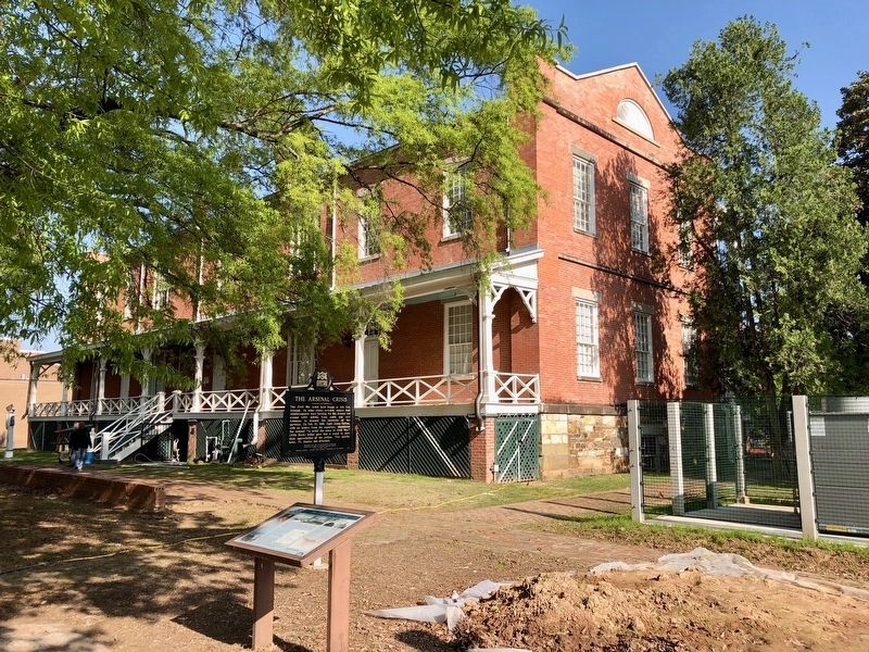 The Arsenal Crisis Marker next to the Tower Building, only original building still standing. image. Click for full size.