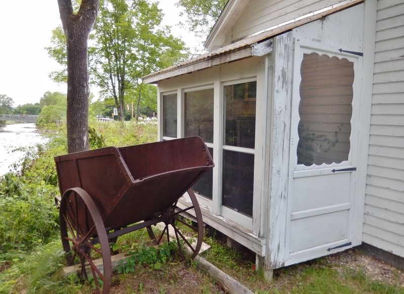 Rusted wheelbarrow displayed nearby; used to feed charcoal, iron ore & limestone into furnace. Click for full size. Rusted wheelbarrow displayed nearby; used to feed charcoal, iron ore & limestone into furnace image. Click for full size.