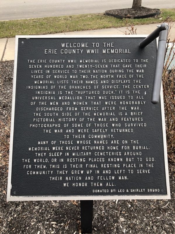 Plaque at entrance to memorial image. Click for full size.