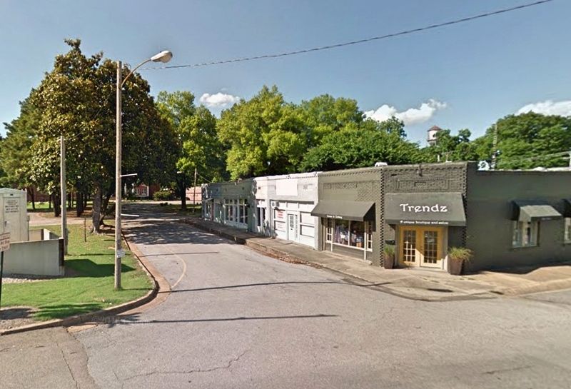 Rebuilt one-story brick buildings.. Click for full size. Rebuilt one-story brick buildings. image. Click for full size.