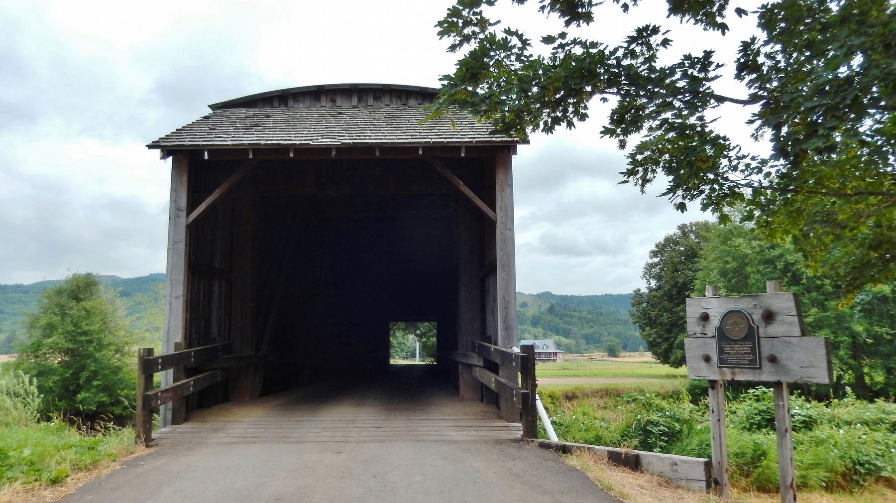 Grays River Covered Bridge Marker (<i>wide view; marker right of bridge</i>) image. Click for full size.