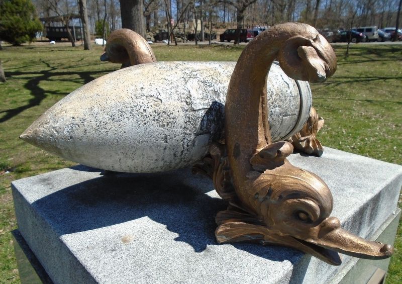 The Battleship Maine Memorial Shell and Dolphins. Click for full size. The Battleship Maine Memorial Shell and Dolphins image. Click for full size.
