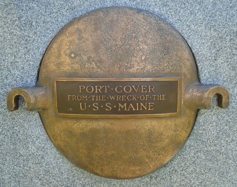 The Battleship Maine Memorial Port Cover. Click for full size. The Battleship Maine Memorial Port Cover image. Click for full size.