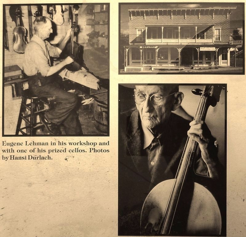 Marker detail: Eugene Lehman in his workshop and with one of his prized cellos image. Click for full size.