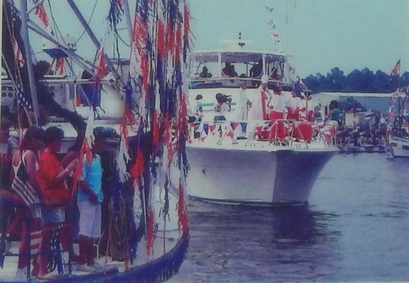 Marker detail: Crowds gather as the Archbishop blesses each boat in the Bayou La Batre fleet image. Click for full size.