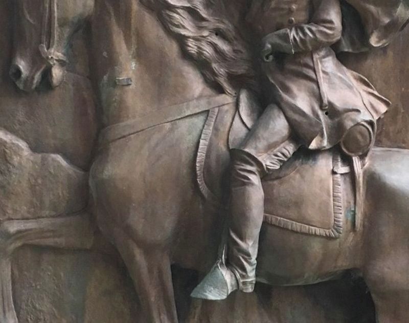 Custer Monument Bas-Relief Vandalized image. Click for full size.