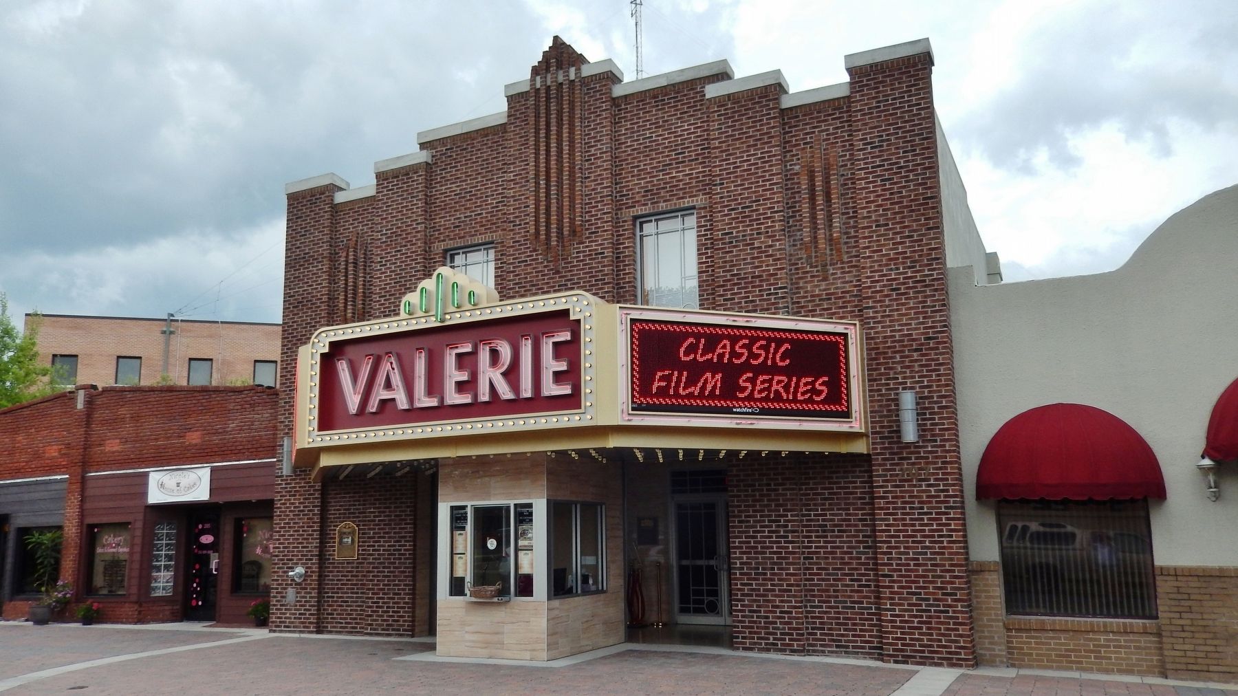 Valerie Theater (<i>wide view; marker visible on wall, left of entrance</i>). Click for full size. Valerie Theater (<i>wide view; marker visible on wall, left of entrance</i>) image. Click for full size.