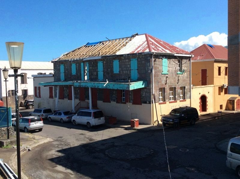 The Barracoon Building was also heavily damaged during Hurricane Maria in September 2017 image. Click for full size.