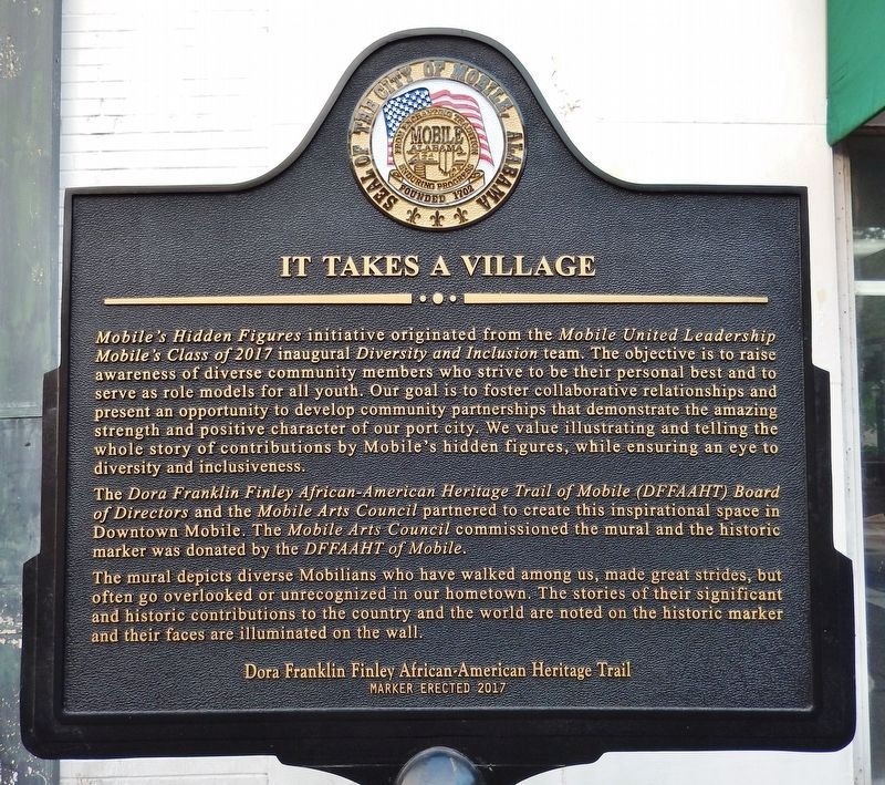 It Takes a Village Marker (<i>front side</i>). Click for full size. It Takes a Village Marker (<i>front side</i>) image. Click for full size.