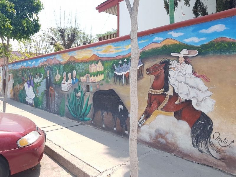 A nearby mural with historical themes from the area image. Click for full size.