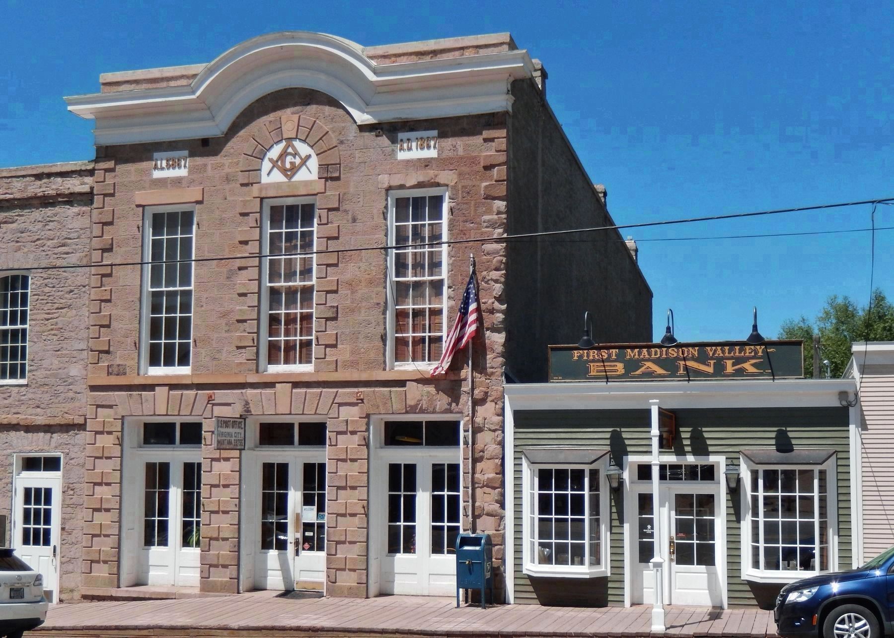 Today: Masonic Temple houses US Post Office & Dr. Daems City Drug Store Building houses a bank image. Click for full size.