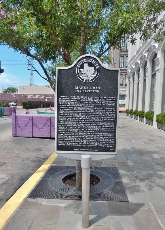 Mardi Gras in Galveston Marker (<i>tall view; looking west along Mechanic Street</i>). Click for full size. Mardi Gras in Galveston Marker (<i>tall view; looking west along Mechanic Street</i>) image. Click for full size.