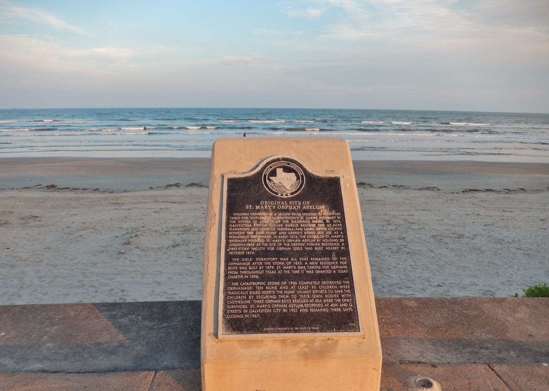 Original Site of St. Mary's Orphan Asylum Marker (<i>wide view; Galveston Beach in background</i>) image. Click for full size.