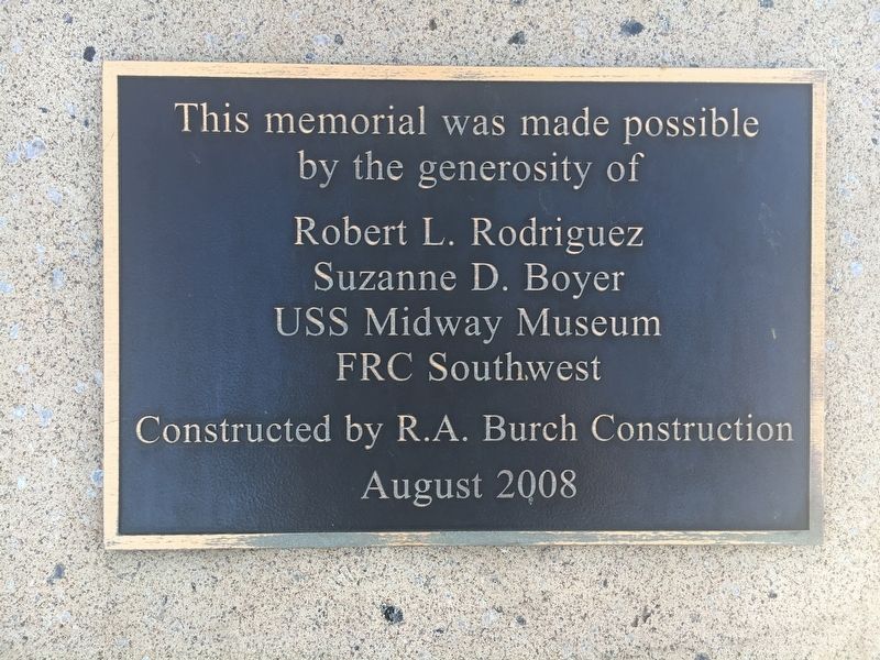 Plaque on the cement stand supporting the A-4 Jet image. Click for full size.