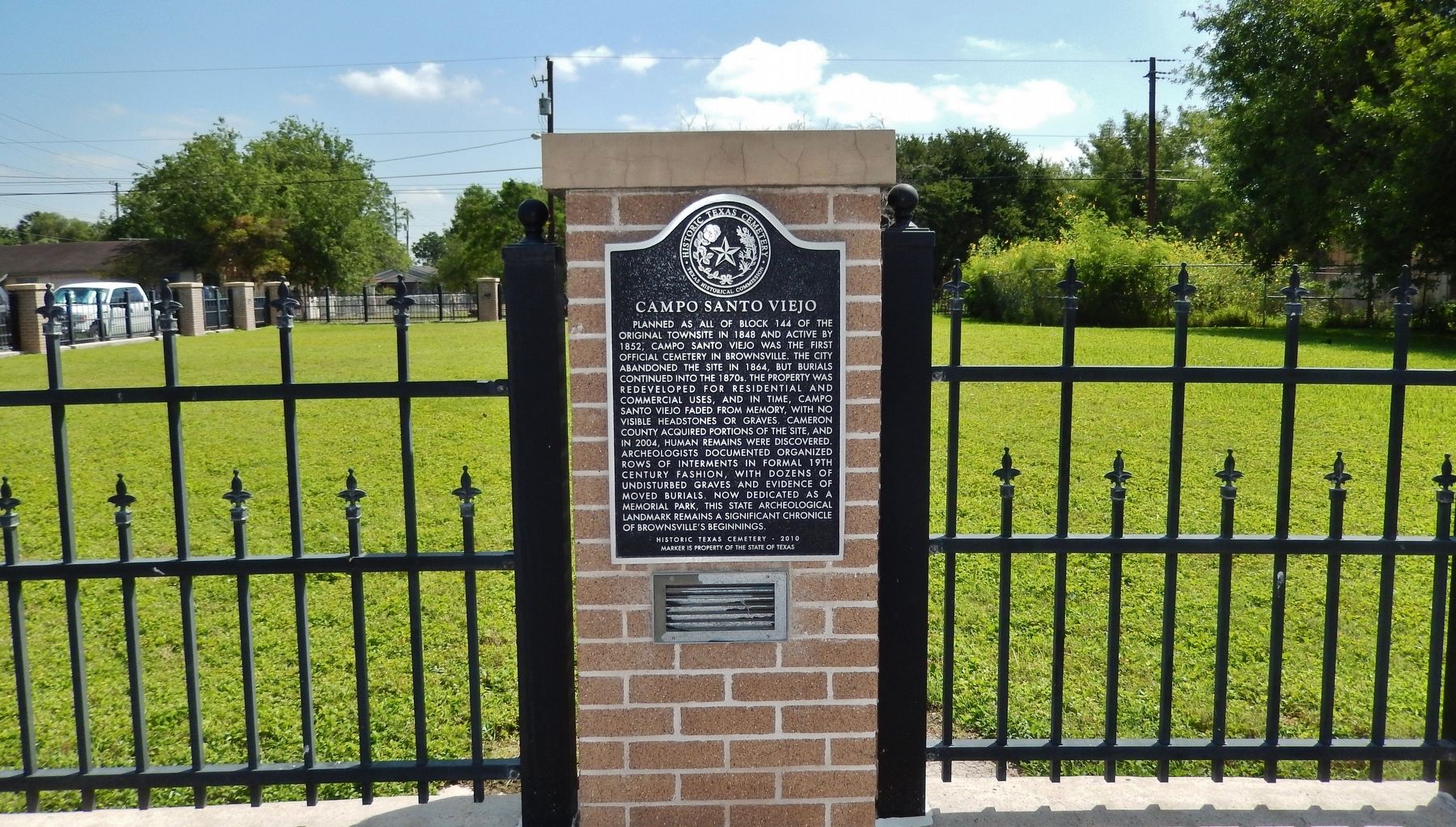 Campo Santo Viejo Marker (<i>wide view; memorial park is behind marker and fence</i>) image. Click for full size.
