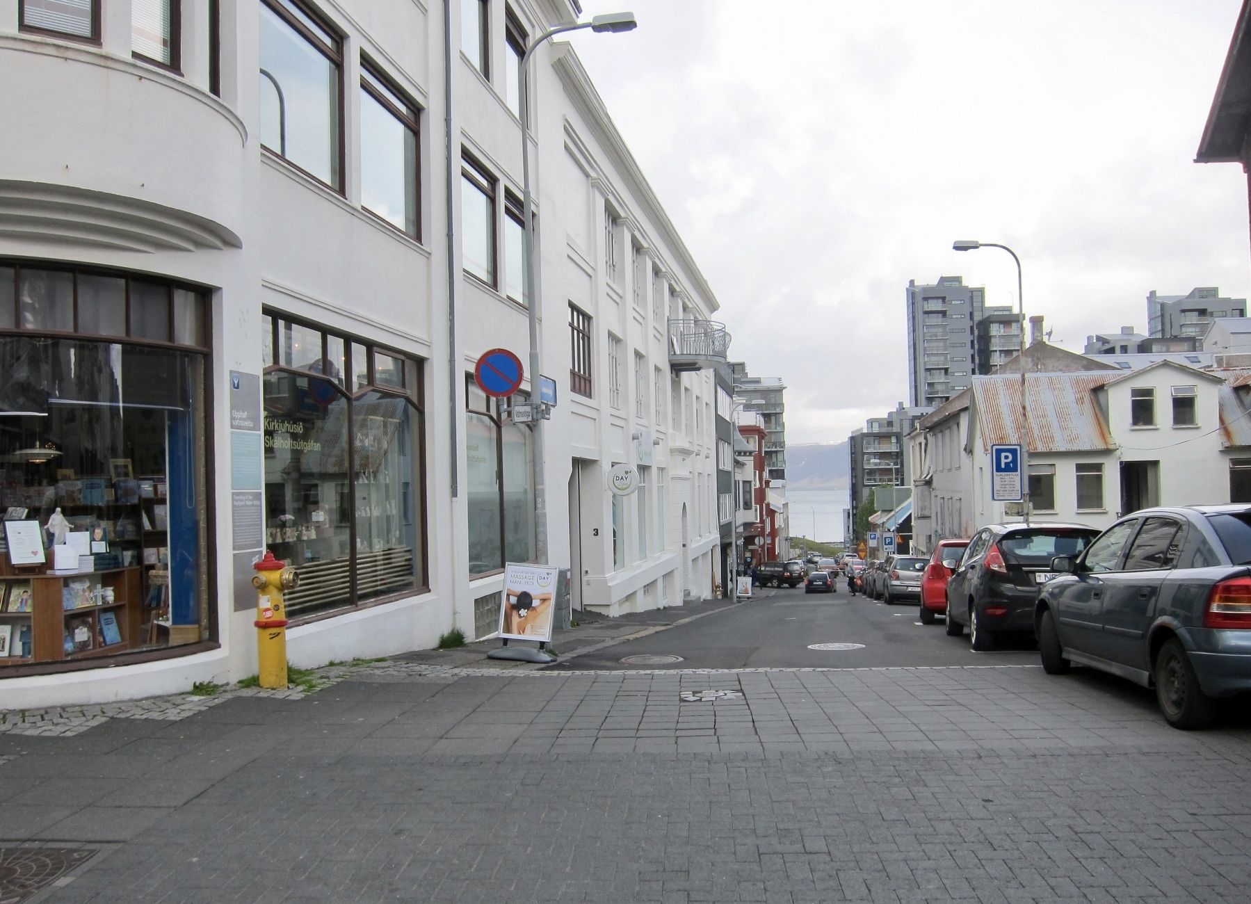 Founding of the Reykjavik Water Utility marker - Wide view, looking north on Vatnsst�gur image. Click for full size.