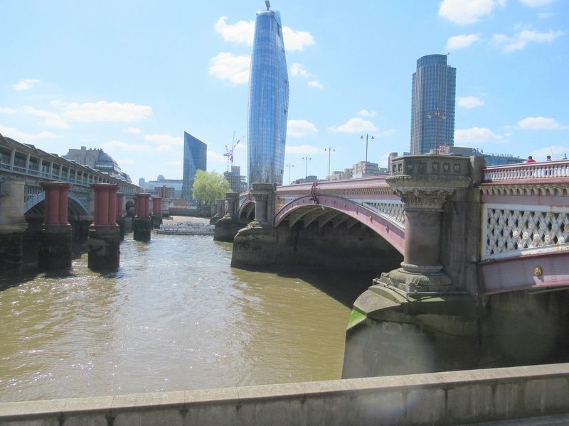 Looking south over the River Thames. Blackfriars Bridge on the right. On the left is the Blackfriars image. Click for full size.
