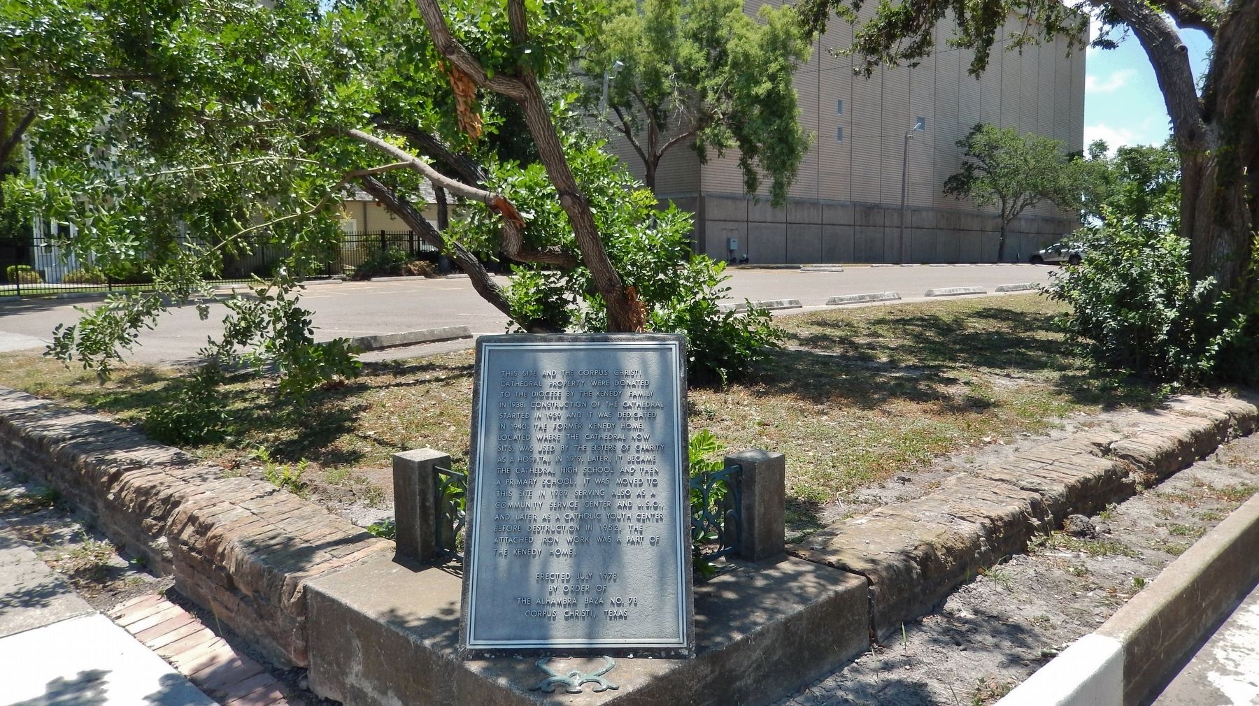 Corpus Christi Cathedral Site Marker (<i>wide view showing wrought iron pieces from Kenedy home</i>) image. Click for full size.