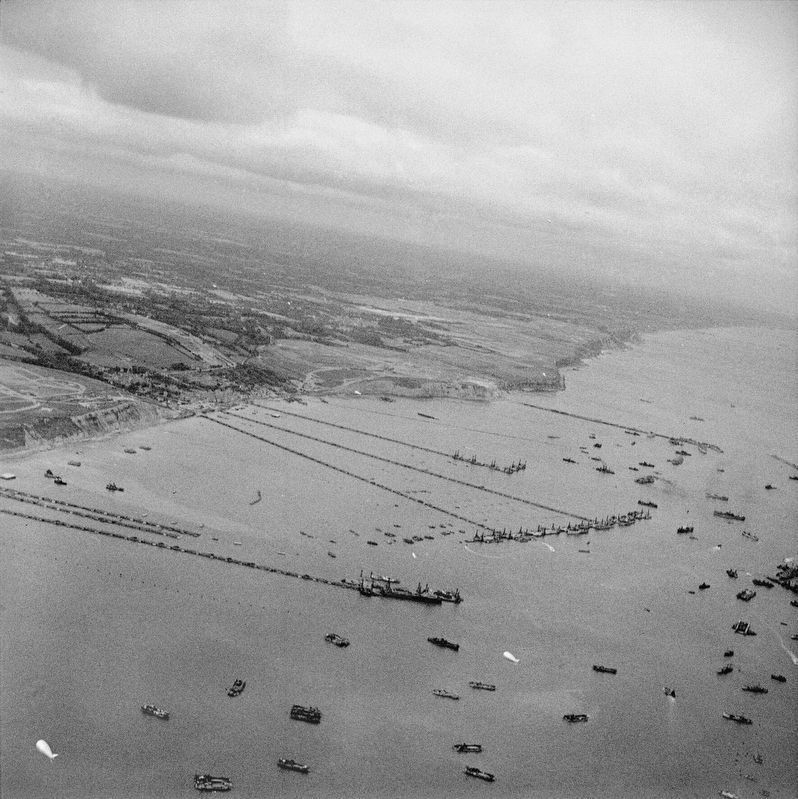 The Mulberry artificial harbour off Arromanches in Normandy image. Click for full size.