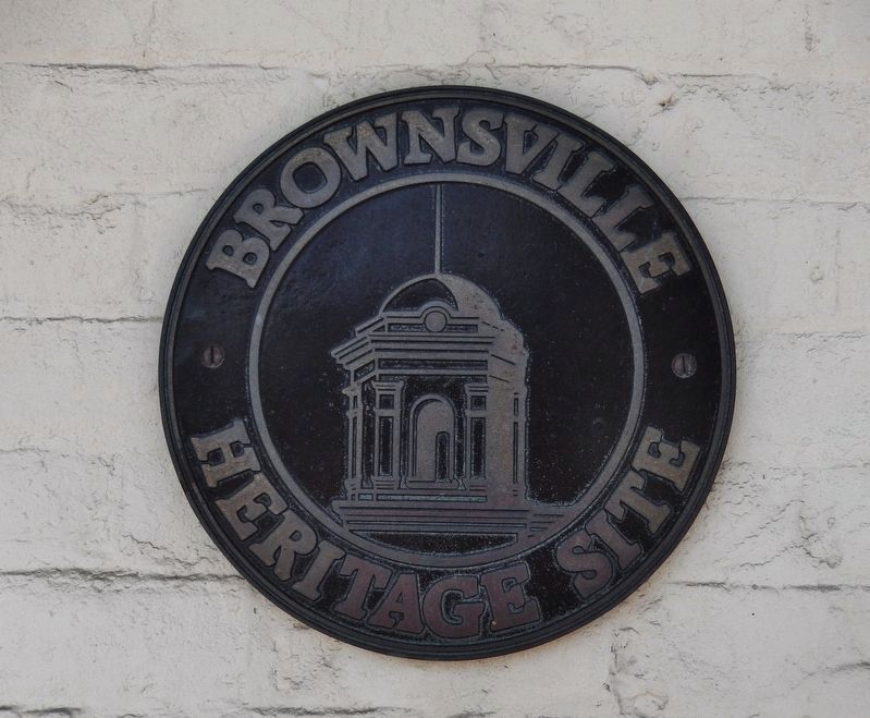 Brownsville Heritage Site Medallion (<i>also mounted on building; facing East St Charles Street</i>) image. Click for full size.