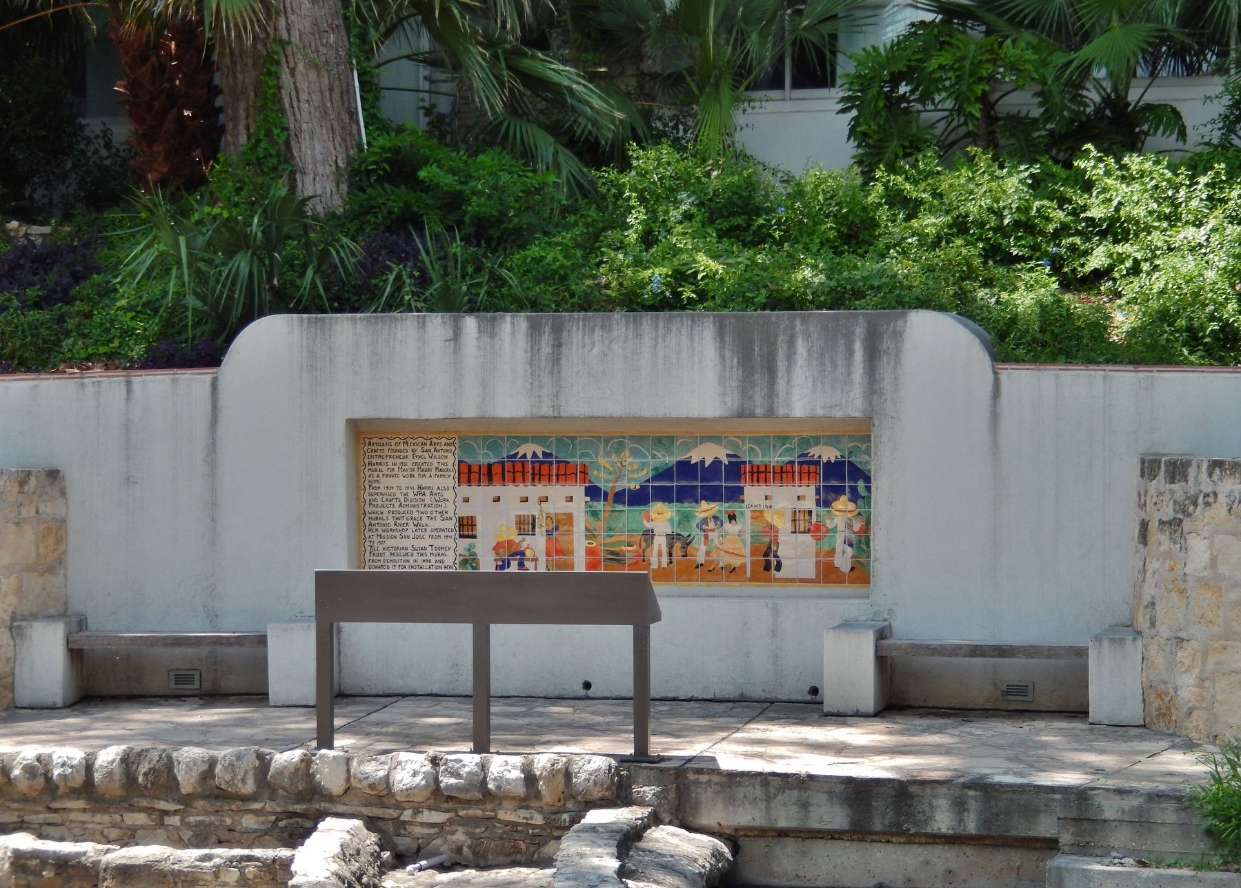 The Hugman Dam Marker (<i>backside of marker & unrelated mural, as seen from across the river</i>) image. Click for full size.