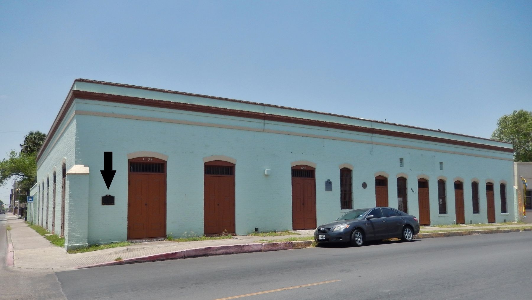 Old County Jail / Fernandez Building Marker (<i>wide view; marker visible at left</i>) image. Click for full size.