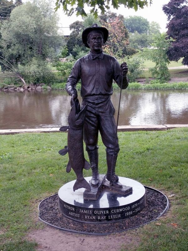 Statue of James Oliver Curwood. Click for full size. Statue of James Oliver Curwood image. Click for full size.