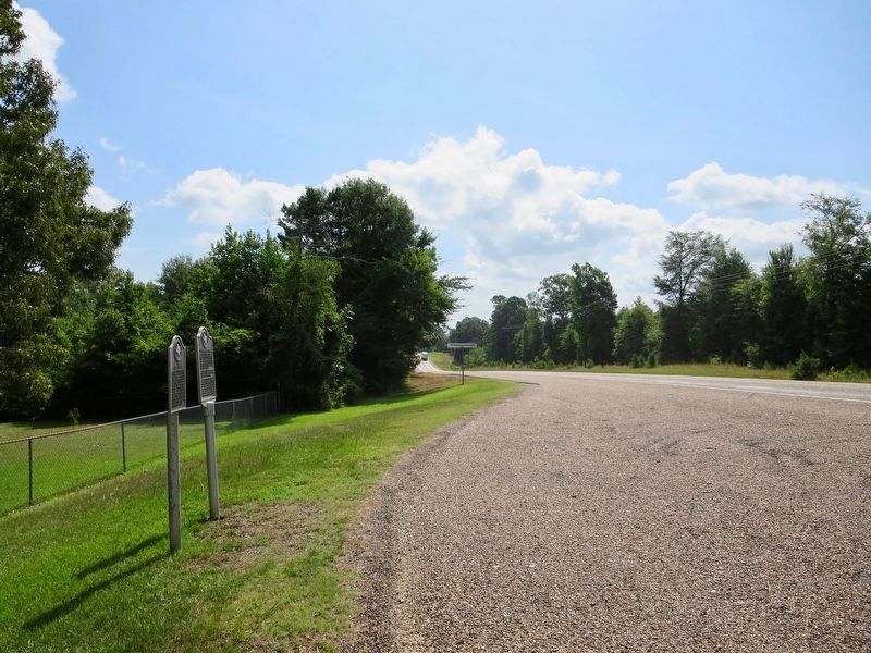 View looking east on Texas Highway 155 towards Avinger. image. Click for full size.