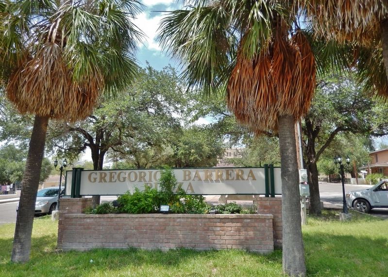Gregorio Barrera Plaza Sign (<i>view north from 3rd Street; marker is located behind this sign</i>) image. Click for full size.
