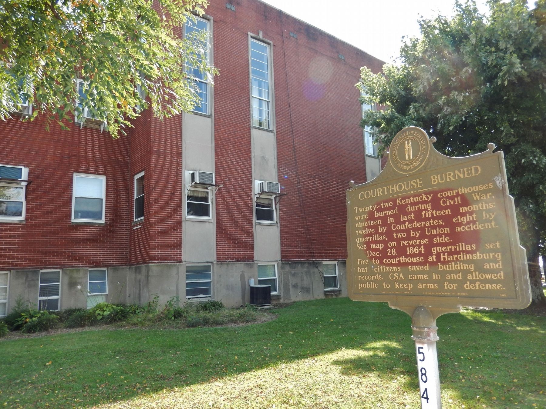 Courthouse Burned Marker (<i>wide view; Breckinridge County Courthouse in background</i>). Click for full size. Courthouse Burned Marker (<i>wide view; Breckinridge County Courthouse in background</i>) image. Click for full size.